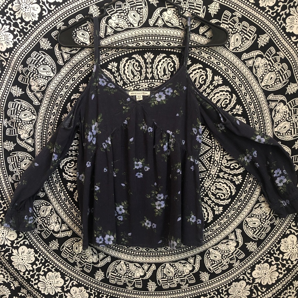 blue floral open shouldered shirt